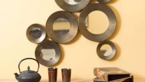 Composizione di specchi da arredo in Metallo e bronzo